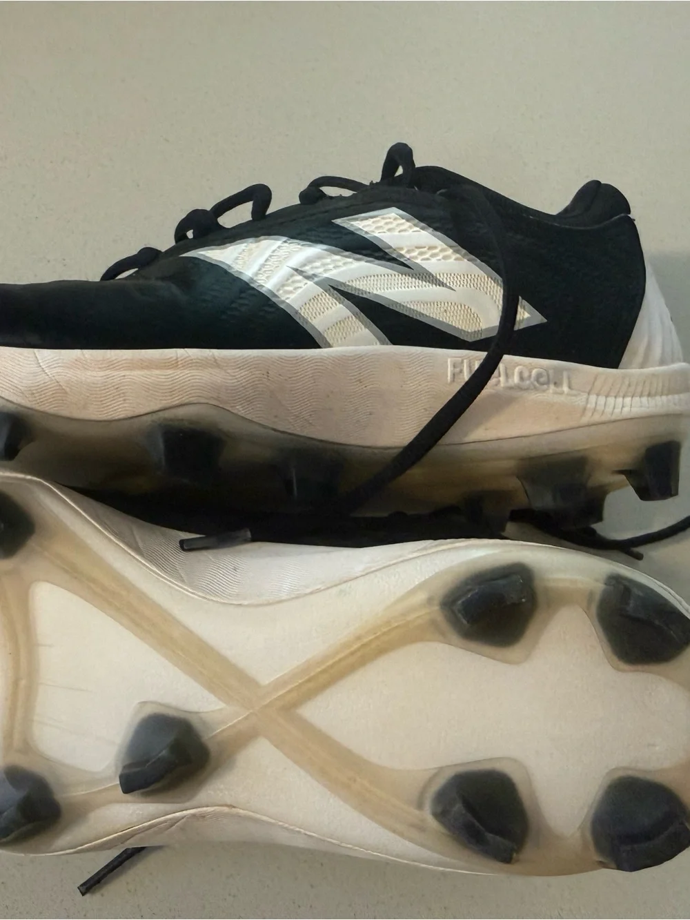 Black NB Cleats with White Insole Lettering great shape like new size M 8.5 W 10